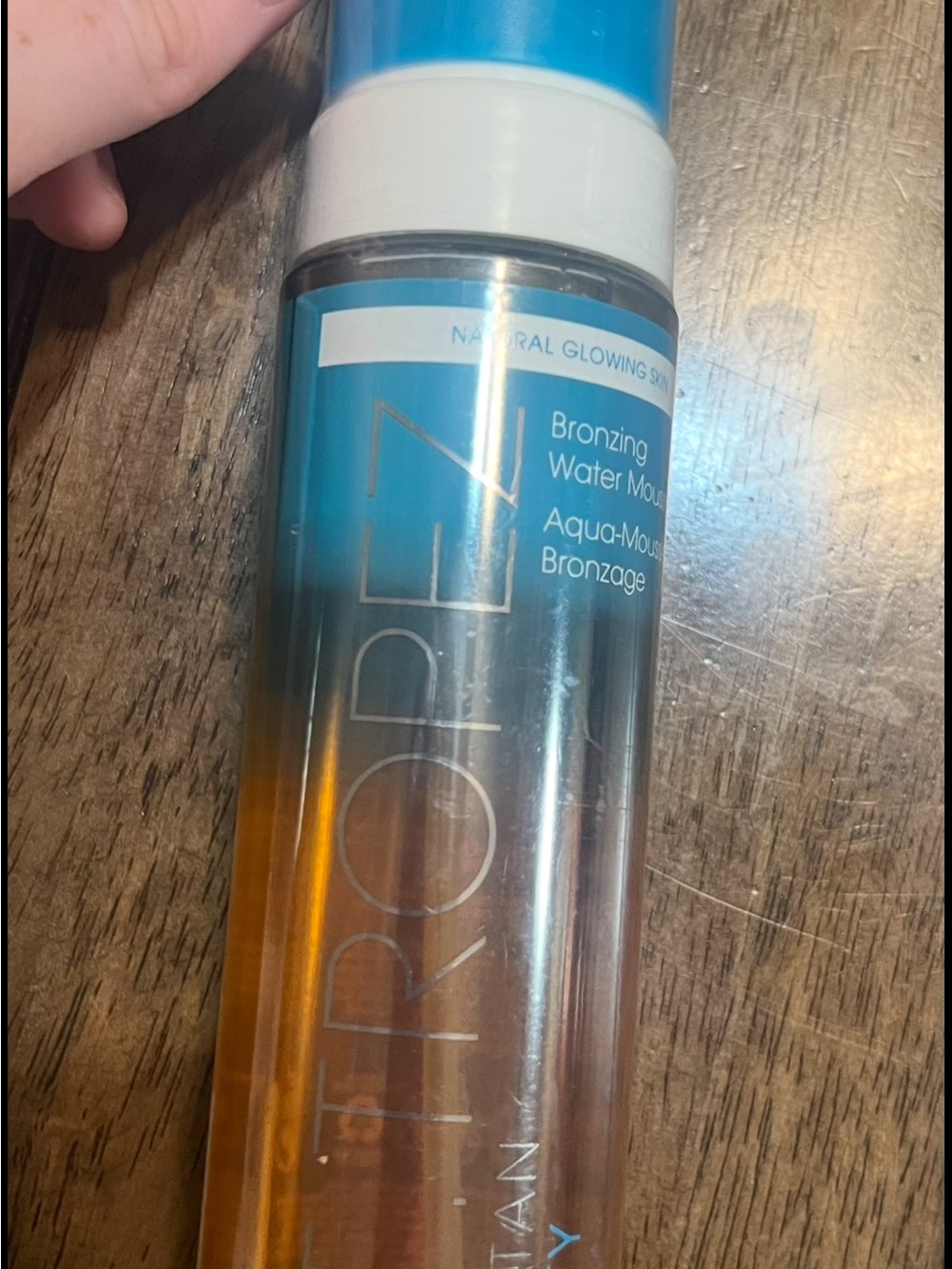 St. Tropez Bronzing Water Mousse - Blue Cap with Amber Liquid